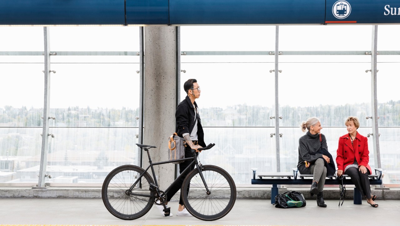 Man with bike at Sunalta Station